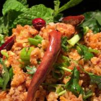 #J12 Nam Kao (Crispy Rice Salad) · Crispy rice with shredded coconut, cilantro, peanuts, green onion, mint, and crispy chilies ...