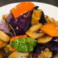 #J23 Eggplant Tofu · Asian eggplant wok-tossed with black bean sauce, mushroom, red bell, and basil.