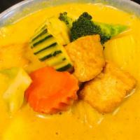 #J41 Yellow Curry · Mild curry, carrot, turmeric fresh herbs, spices, coconut milk, and potatoes.