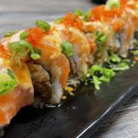 Kakuna Roll · inside - crab, spicy tuna, onion
outside - salmon, spicy mayo, miso, eel sauce, seared, scal...