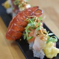 High Roller Roll · inside - lobster tempura, spicy tuna, crab, avocado
outside - tuna, salmon, escolar, yellowt...