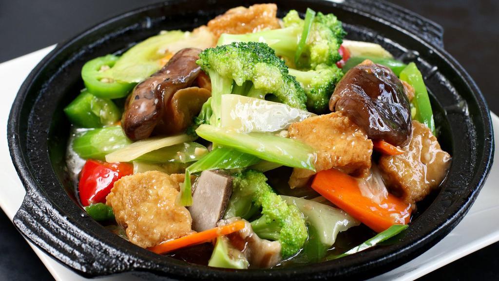 Clay Pot · Choice of vegetarian clay pot, clay pot chicken with mushrooms or house special clay pot with shrimp, fish, chicken, and pork.