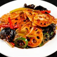 Crunchy Chengdu-Style Lotus Root · Thinly sliced lotus root is stir-fried in the wok with scallions, chili-bean paste and other...