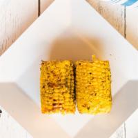 Corn On The Cob · Sweet corn topped with spices.