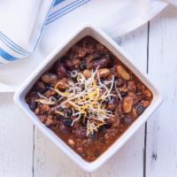 Vegetarian Chili · consist of a ground crumble with black, red, and white beans. (16oz).
