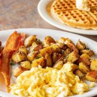 Combo Breakfast #3 · 2 bacon, 2 sausages, 3 eggs, hash browns, and waffle

Choice of  egg

1/. Scramble or 

2/. ...