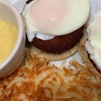 Crabcake Benedict · 2 scrambled eggs, 2 crab cakes, on English muffin with  hollandaise sauce.