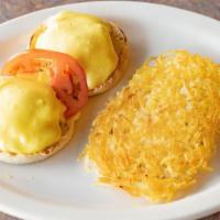Eggs Benedict · 2 poached eggs, 2 Canadian bacon, on English muffin with hollandaise sauce