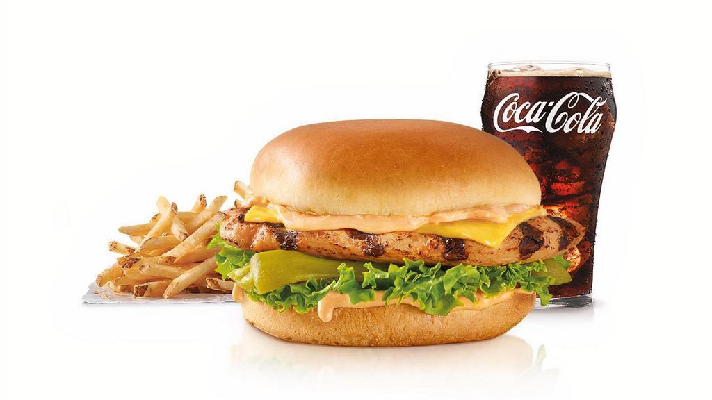 Charbroiled Santa Fe Chicken™ Sandwich Combo · Charbroiled chicken breast, melted American cheese, mild green chile, lettuce and Santa Fe Sauce on a potato bun. Served with fries and a beverage. .