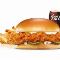 Hand-Breaded Chicken Sandwich Combo · Premium, all-white chicken fillet, hand dipped in buttermilk, lightly breaded and fried to a...