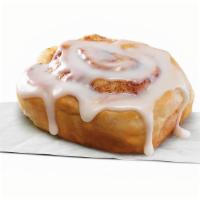 Cinnamon Roll · Flakey, gooey, pillow-y goodness topped with sweet icing, served warm..