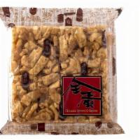 Chinese Sweet Crispies 全蛋馬仔 · A traditional manchu delicacy the sweet crispy is made of flour eggs and sesame with honey o...