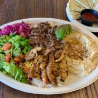 3. Combo Gyros · Slow cooked lamb and beef and chicken.