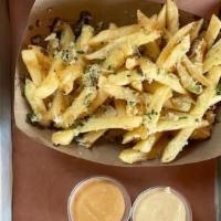 Garlic Fries · Fresh Garlic and Parmesan tossed with fries. Served with a chipotle aioli