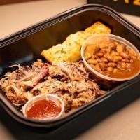 Pulled Pork Combo Meal · Smoked Pulled Pork Boxed Meal - Includes choice of side, garlic bread, sauce and fixins
