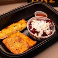 BBQ Salmon Combo Meal · Smoked Salmon Boxed Meal - Includes choice of side, garlic bread, sauce and fixins