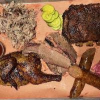 Large BBQ Sampler a la carte · Meant for groups of 4 to 5 to sample five meats or for groups of 2 to 3 to gorge! Includes 1...