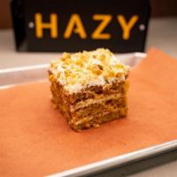 Dolly's Carrot Cake · Great Granma Dolly's recipe incorporates walnuts in the batter and cream cheese frosting goo...