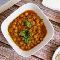 Chana Masala · Garbanzo beans cooked with punjabi style curry.