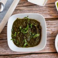 Palak Gosht · Spinach cooked with curry sauce.