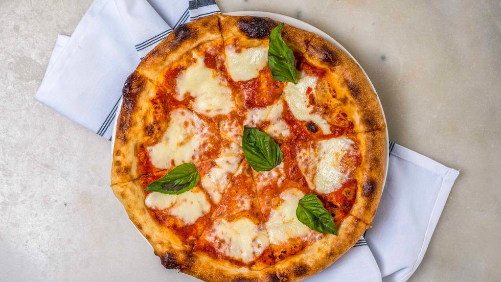 Margherita Pizza · Basil, Tomato, Fresh Mozzarella.