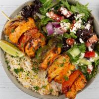 Chicken Shawarma Plate · Marinated shredded chicken served with basmati rice, side salad, fresh pita, and your choice...