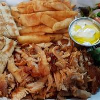 Chicken Gyro Plate · Tender chicken gyro served with basmati rice, side salad, fresh pita and your choice of sauce.