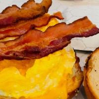 Breakfast Bagel · Served with egg, cheese, and sausage or bacon.