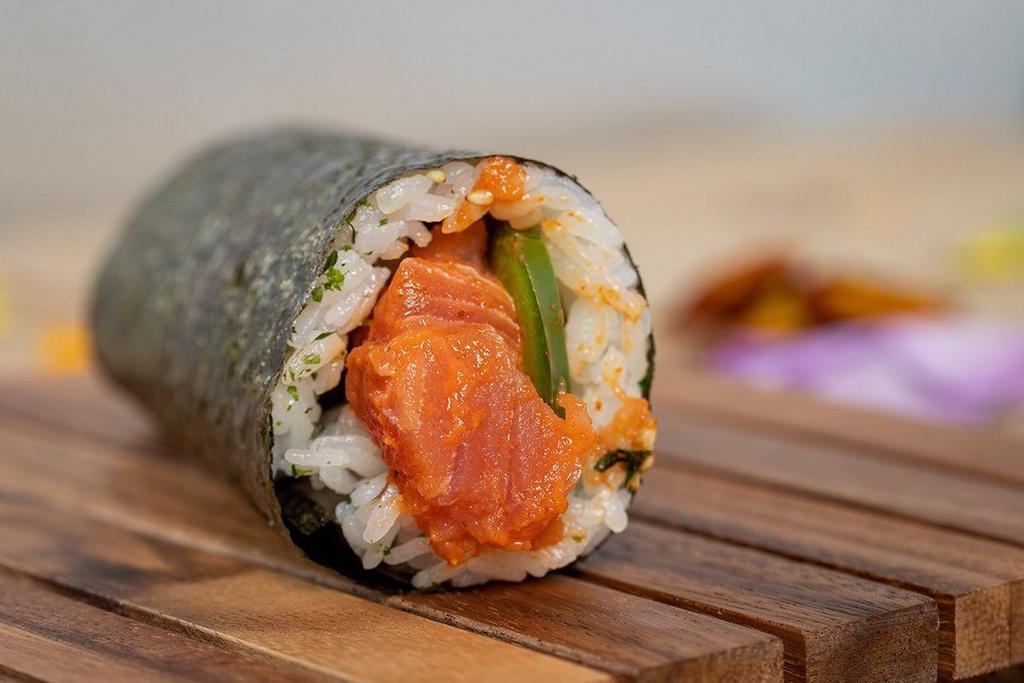 Spicy Tuna Hand Roll · Our popular spicy tuna rolled with cucumber and furikake.
