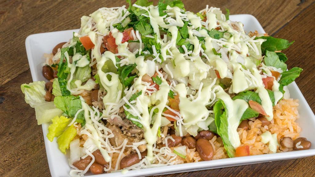 Bowl · Your choice of Mexican rice, beans, lettuce, cabbage, onion, tomato, cilantro, shredded cheese, sour cream, choice of cheese.