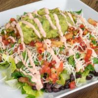 Salad · Includes lettuce, choice of beans, cabbage, onion, tomato, cilantro, shredded cheese, sour c...