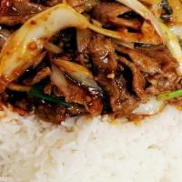 11. Mongolian Beef Over Steam Rice · Hot and spicy.