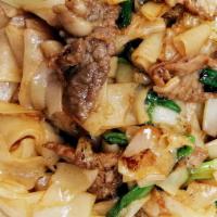 13. Chow Fun · With stir-fried rice noodle and onions.