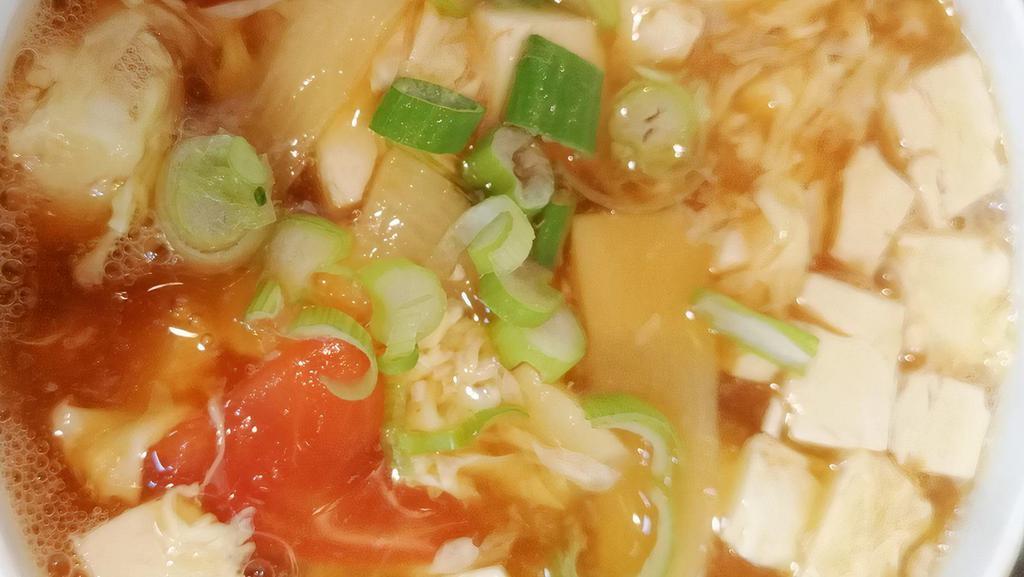 2. Hot & Sour Soup · hot and spicy. with tofu, carrots. tomatoes, chicken, and bamboo shoots.