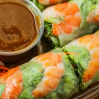Spring Rolls · Fresh rolls wrapped in rice paper filled with lettuce, carrots, bean sprouts, cucumber and r...