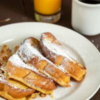 French Toast Platter · Cinnamon dipped challah bread topped with powdered sugar.