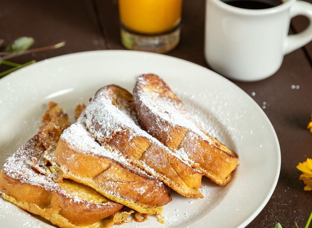 French Toast Platter · Cinnamon dipped challah bread topped with powdered sugar.
