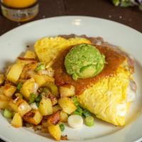 Tijuana · Fluffy omelet filled with refried beans and jack cheese topped with fresh salsa and avocado.