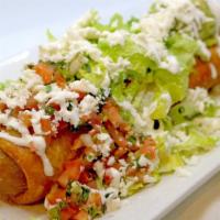 Chimichanga · Yolked extreme breakfast. Fried crispy burrito filled with shredded chicken, beans and jack ...