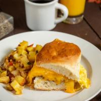 Biscuit & Egg Sandwich · Large biscuit layered with scrambled eggs, patty sausage and cheddar cheese.