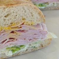 3. Black Forest Ham Sandwich · Black forest smoked ham on freshly baked sourdough. Includes lettuce, tomato, red onions, sw...