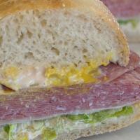 4. Genoa Salami Sandwich · Italian genoa salami on freshly baked sourdough. Includes lettuce, tomato, red onions, swiss...