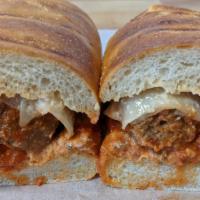 CRUST Italian Meatball Sourdough Sandwich  · Original Beef Meatballs In Warm House Marinara With Melted Provolone Cheese