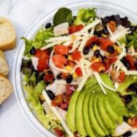 Southwest Chicken Salad · Chopped Romaine and Spring Mix,  PepperJack Cheese, Avocado, Black Bean/ Corn Salsa, Sour Cr...