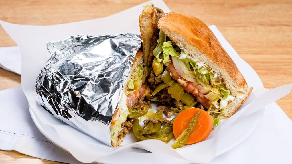 Tortas · Cheese, onion, tomato, guacamole, mayonnaise jalapeños and sour cream. Your choice of meat.
