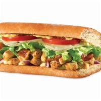 Honey Mustard Chicken Sandwich · Chicken, bacon, Swiss, lettuce, tomatoes, onions, and honey mustard dressing with italian wh...