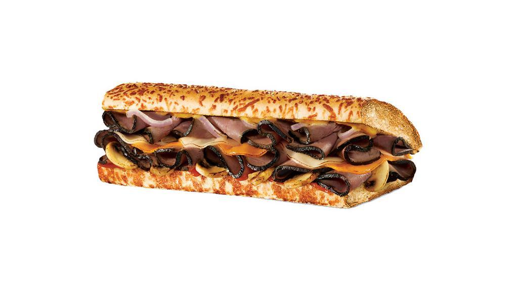 Black Angus Sub · Black Angus Steak, Mozzarella and Cheddar cheese, Sautéed Mushrooms and Onions with Honey Bourbon dressing and Zesty Grille Sauce on our Rosemary Parmesan. 480-1030 Cals.