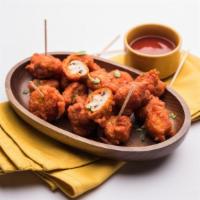 Mushroom 65 · Mushrooms marinated with Indian spices and deep-fried.