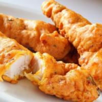 Chicken Pakoras · Tender boneless chicken deeply fried