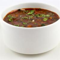 Hot & Sour Soup · Spicy and tangy soup of mushrooms and other vegetables.